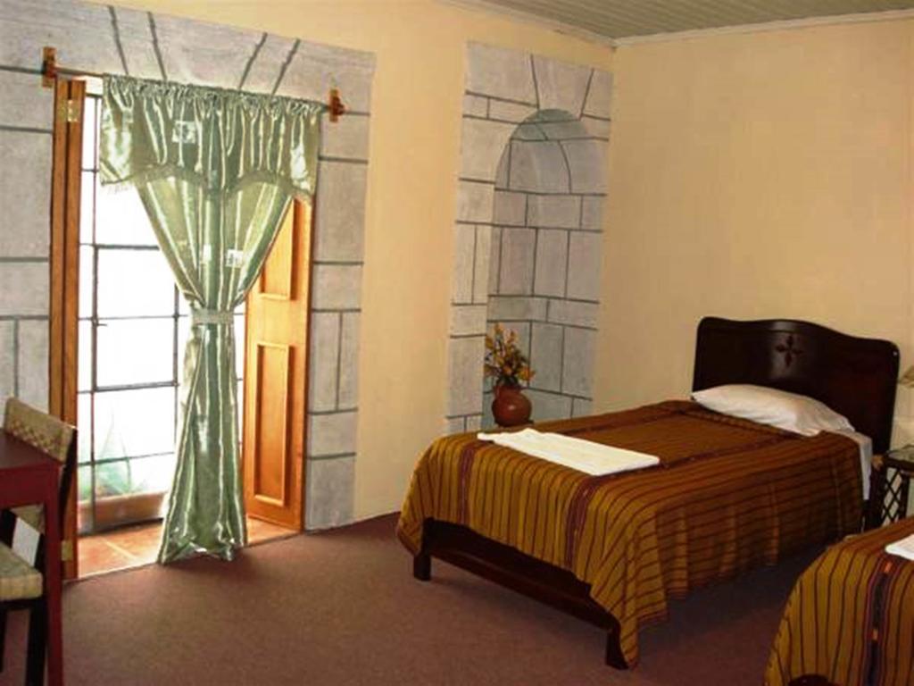 Hostal Casa Dona Mercedes Кесальтенанго Номер фото